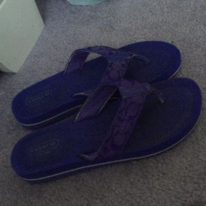 Purple coach flip flops